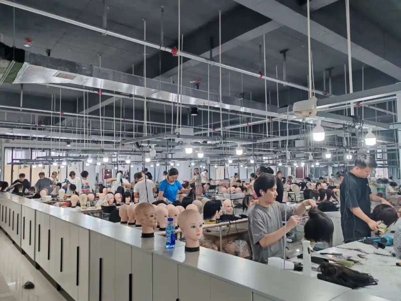 Wig factory workers manufacturing wigs
