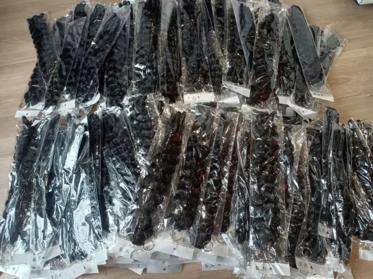 Assorted bulk Wholesale Human Hair wigs and hair bundles display